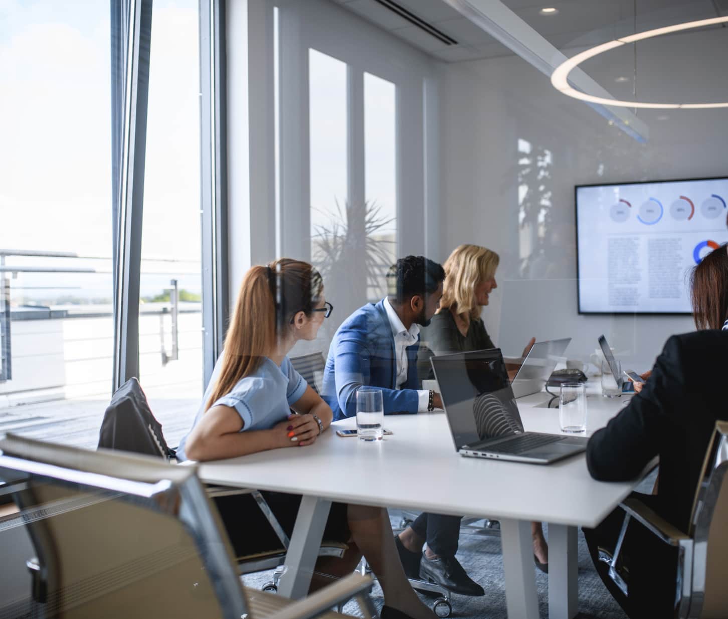 Team members meeting in a bright office