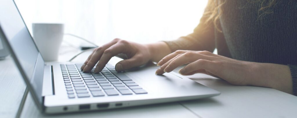 Scenario Testing Crafting Reliable Accounting Tools for the Digital Age Hands typing on a laptop keyboard